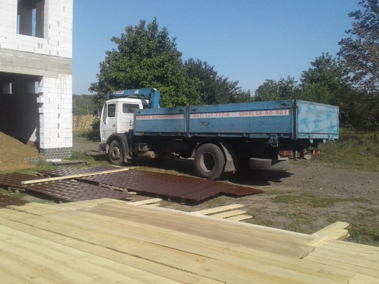 Перевозка и доставка металлочерепицы манипулятором в Харькове